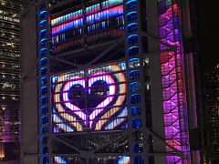 06C HSBC Building lit up in a heart shape with many colours for the Symphony of Lights from Sevva rooftop bar Hong Kong